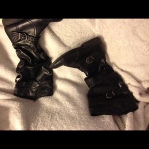 Black knee high boots.