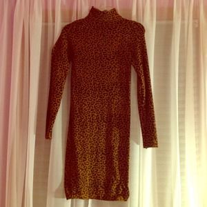 Cheetah fitted dress. Bebe