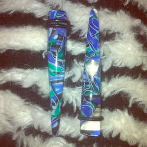 Blue black and green swirl tapers