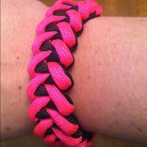 Pink and black paracord bracelet