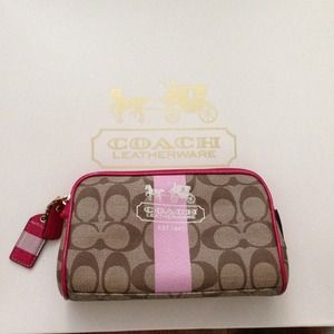 Small Coach bag. Used as make up bag.