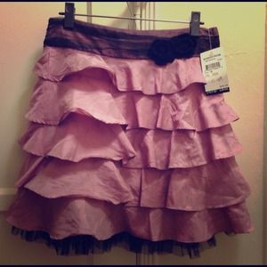 Cute girl size pink and black ruffled skirt!