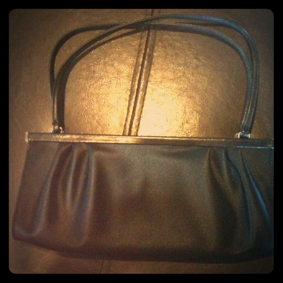 Satin and leather clutch
