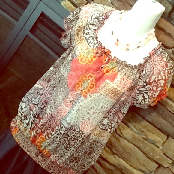 Adorable sheer patchwork top!