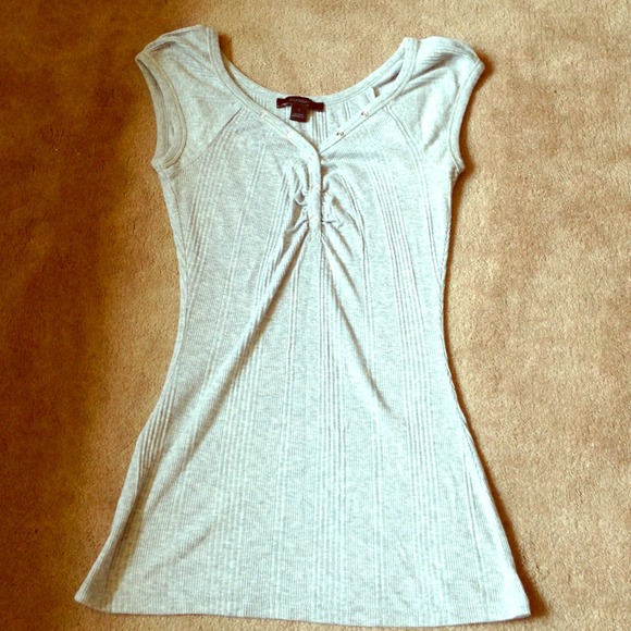 Cute Grey express tee with button/ snaps.