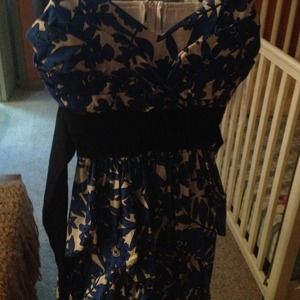 Blue and white ruffle dress with black belt