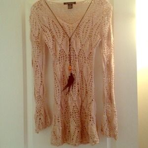 Knitted tunic with neck detail