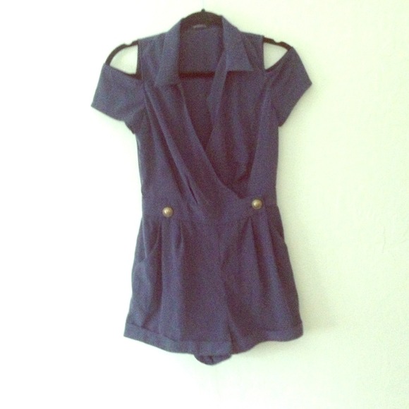 Nautical Romper with cut out sleeves.