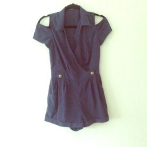 Nautical Romper with cut out sleeves.