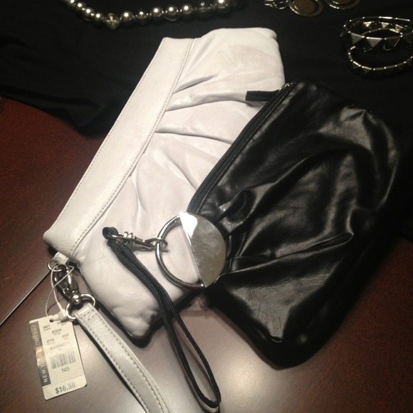 2 clutches white is NWT and black is barely used!