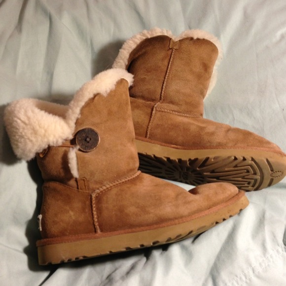 One button UGG boots barley worn.