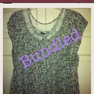 Cute small flower top trimmed in lace.