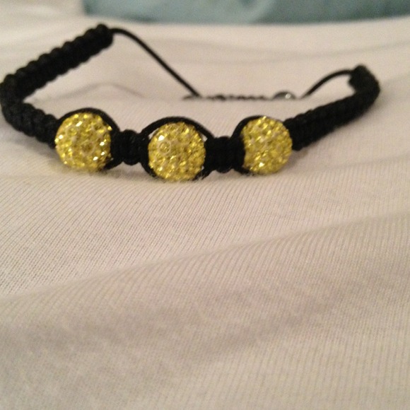 Yellow and black Tresor Paris bracelet