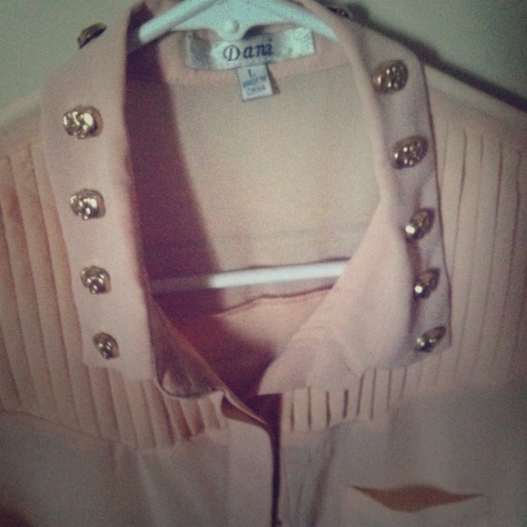 Pink loose skull embellished top