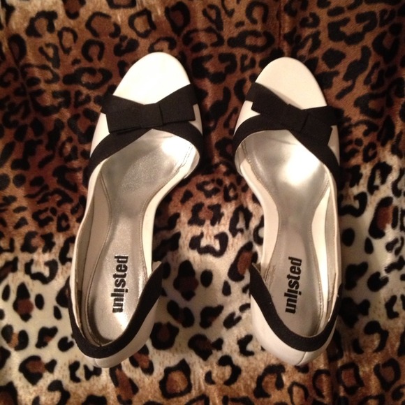 Like new black and white heels