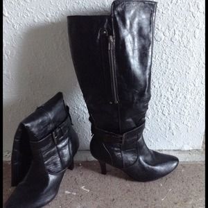 Black high heel boots.