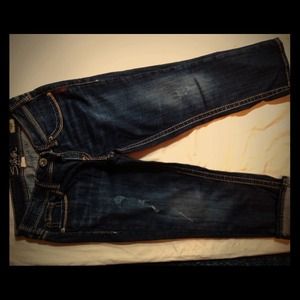 Lightly distressed, dark wash capris