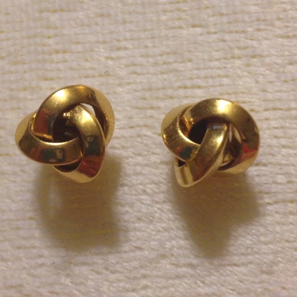 Gold love knot stud earrings.