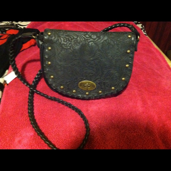 Over the should black purse.