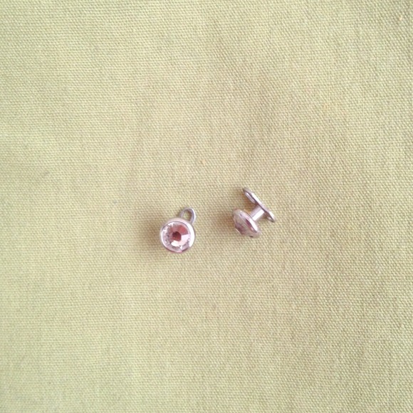 Two dermal piercings