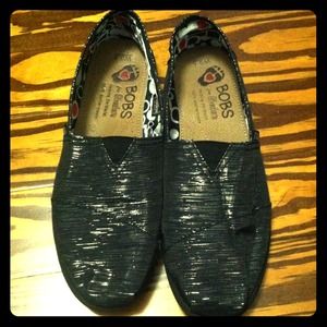 Black with silver Bob's by Skechers. Worn once.