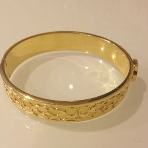 Gold Coach bracelet