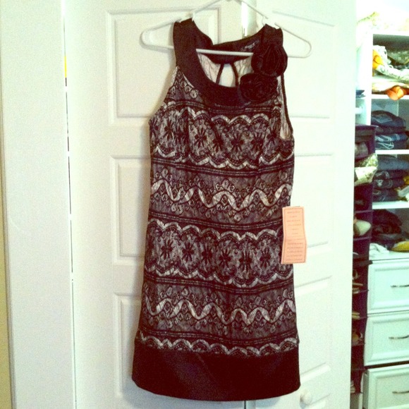 Black and champagne lace dress. From Dillard's.