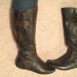 Tall brown leather boots