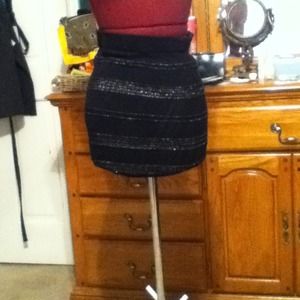 Fitted black skirt with silver sparkle detail