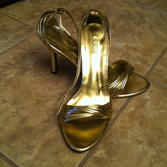 Brand new!! Gold stiletto high heels.