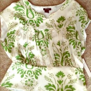 White and green blouse.