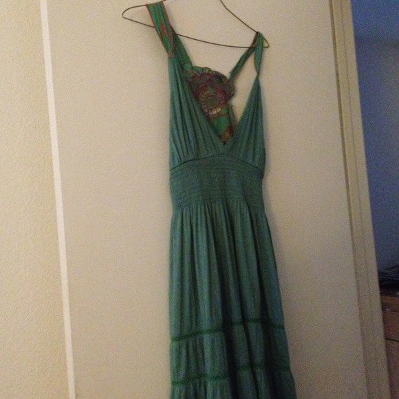 Teal dress with flower pattern on back
