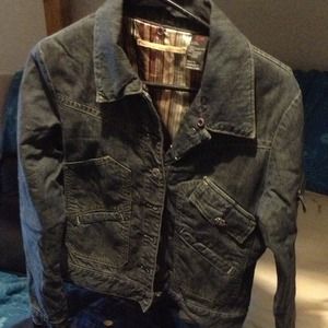 Button jacket with a lot of pockets.