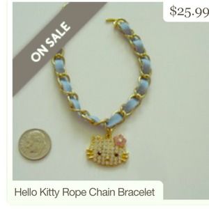 Hello Kitty gold and baby blue charm bracelet