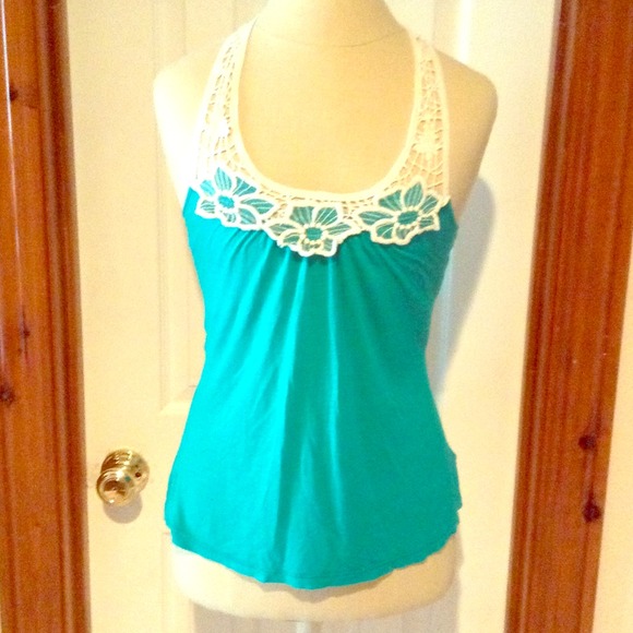 beautiful turquoise top with crochet detail!