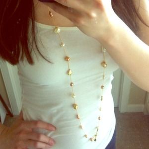 24k gold, long strand pearl necklace by Dabby Reid