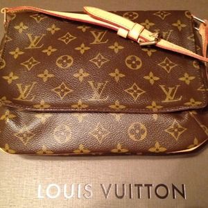 Louis Vuitton mussett tango authentic w/dust bag