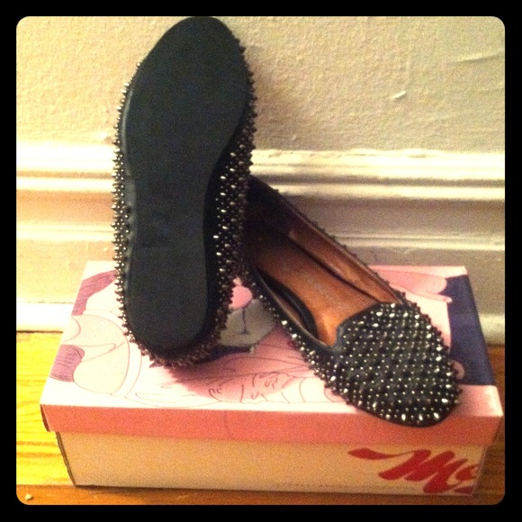 Black leather flat with spikes
