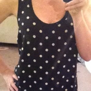 Black and white polkadot top.