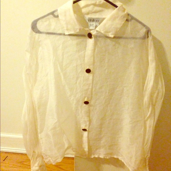 This a super cute sheer blouse.