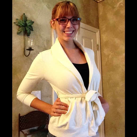 Soft, cream, wrap around jacket.