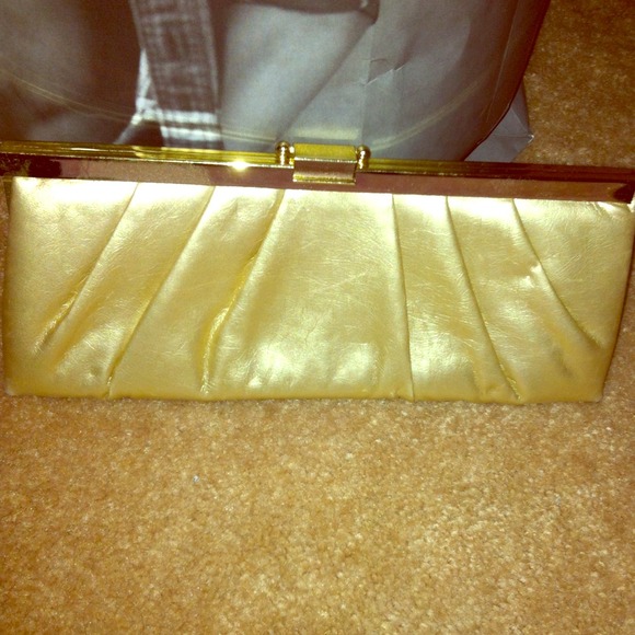 Gold Evening clutch by Jessica McClintock