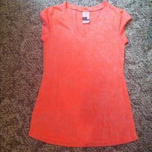 Sheer, bright orange top