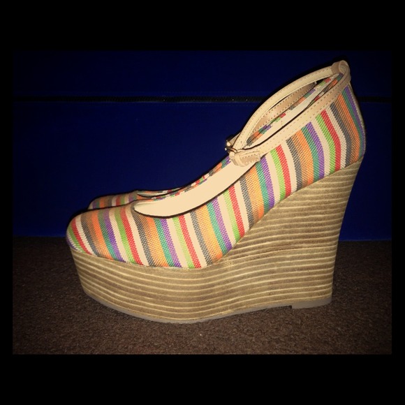 Multi colored Report wedges, women's size 7.5.