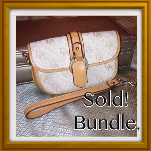 Sold. bundle. Dooney & Burke signature wristlet