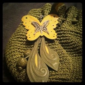 Lime green, brown, and black Brighton bags