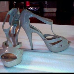 satin pair of nude pumps, only been worn once