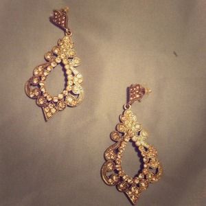 Large gold earrings w/ light pink jewels