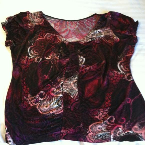 Dressy top in shades of pink.