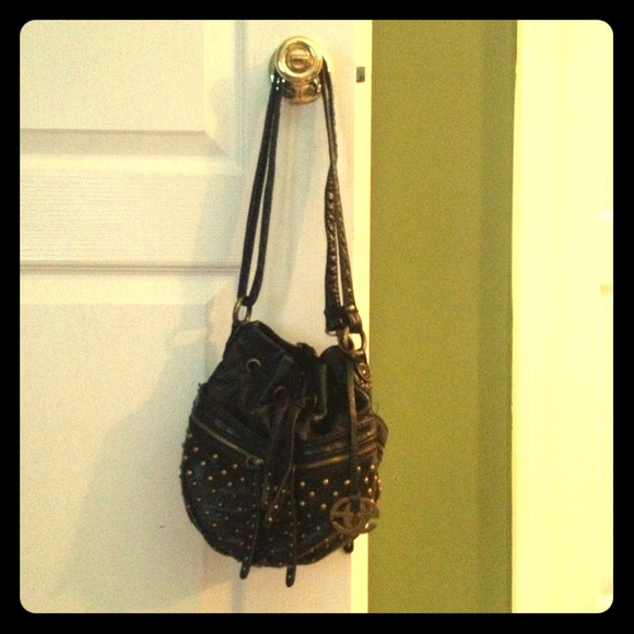 Red by Marc Ecko cross body leather bag.